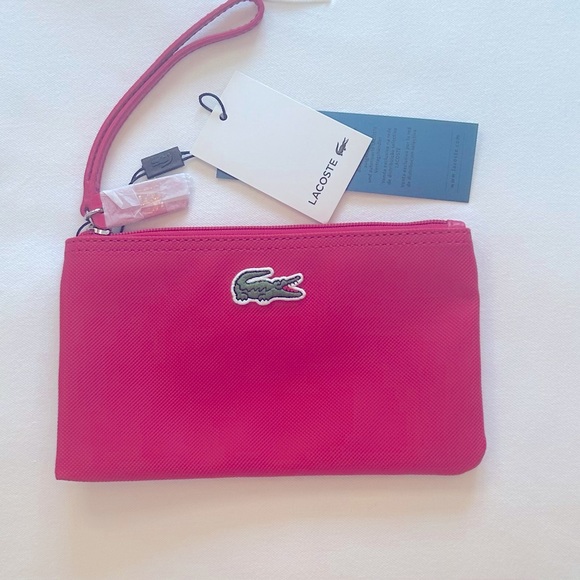Lacoste Handbags - Lacoste Bright Pink Wristlet Clutch NWT 8.25”L x 5”’W